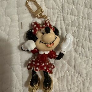 BaubleBar Disney Keychain with Red and Gold Accents